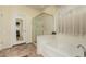 Bathroom with soaking tub, shower, and tiled floor at 30792 N Orange Blossom Cir, San Tan Valley, AZ 85143