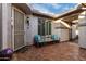 Relaxing courtyard with tile flooring, seating area, and security door at 30792 N Orange Blossom Cir, San Tan Valley, AZ 85143