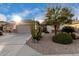 Single-story home with desert landscaping and a two-car garage at 30792 N Orange Blossom Cir, San Tan Valley, AZ 85143