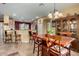 Kitchen with island, breakfast bar, and ample cabinetry at 30792 N Orange Blossom Cir, San Tan Valley, AZ 85143