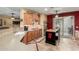 Well-equipped kitchen featuring corner sink, gas cooktop and island at 30792 N Orange Blossom Cir, San Tan Valley, AZ 85143