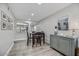 Cozy dining area with a four-person table and gray cabinet at 3301 E Earll Dr # 102, Phoenix, AZ 85018