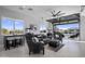 Relaxing game room with a view of the pool and mountains at 33214 N 14Th St, Phoenix, AZ 85085