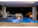 Night view of a luxurious pool and spa at 33214 N 14Th St, Phoenix, AZ 85085