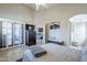 Bright bedroom with sliding glass doors and views at 3324 E Maldonado Dr, Phoenix, AZ 85042