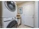 Bright laundry room, Samsung washer and dryer, and access to the home's interior at 3324 E Maldonado Dr, Phoenix, AZ 85042