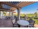 Patio with tables and chairs overlooking golf course at 3324 E Maldonado Dr, Phoenix, AZ 85042