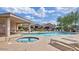 Relaxing pool and spa area with lounge chairs and shaded seating at 3324 E Maldonado Dr, Phoenix, AZ 85042