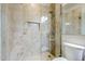 Shower with tiled walls and built-in seat at 3324 E Maldonado Dr, Phoenix, AZ 85042