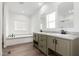 Elegant bathroom with double vanity and soaking tub at 36711 W Harrison St, Tonopah, AZ 85354