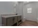 Simple bathroom with single vanity and toilet at 36735 W Harrison St, Tonopah, AZ 85354