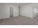 Large bedroom with walk-in closet and access to bathroom at 36735 W Harrison St, Tonopah, AZ 85354