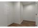 Empty storage room with laminate flooring at 36735 W Harrison St, Tonopah, AZ 85354