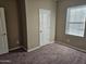 Bright bedroom featuring a closet and window blinds at 36850 W Nola Way, Maricopa, AZ 85138