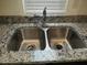 Double stainless steel sink with granite countertop at 36850 W Nola Way, Maricopa, AZ 85138