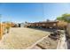 Spacious backyard with large grassy area and raised garden beds at 3750 W Marshall Ave, Phoenix, AZ 85019