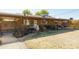 House exterior with large backyard and covered patio at 3750 W Marshall Ave, Phoenix, AZ 85019