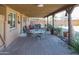 Brick patio with covered seating area, perfect for outdoor entertaining at 3750 W Marshall Ave, Phoenix, AZ 85019