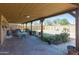 Brick patio with covered seating area, perfect for outdoor entertaining at 3750 W Marshall Ave, Phoenix, AZ 85019