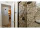 Modern bathroom with a large shower and glass enclosure at 3750 W Marshall Ave, Phoenix, AZ 85019