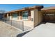 House exterior showcasing a carport and well-maintained yard at 3750 W Marshall Ave, Phoenix, AZ 85019