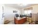 Home office with a large desk and ample storage at 3750 W Marshall Ave, Phoenix, AZ 85019