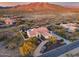 Aerial view of single-story house with pool and desert landscape at 3756 E Galvin St, Cave Creek, AZ 85331