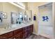 Double vanity bathroom with marble counters and view to bedroom at 3756 E Galvin St, Cave Creek, AZ 85331