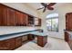 Spacious home office features built-in cabinetry and large window at 3756 E Galvin St, Cave Creek, AZ 85331