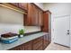 Laundry room offers ample counter space and storage at 3756 E Galvin St, Cave Creek, AZ 85331