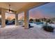 Outdoor patio with built-in grill, overlooking a sparkling pool and mountain views at 3756 E Galvin St, Cave Creek, AZ 85331