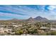 Wide aerial view of neighborhood and mountains at 3809 E Highland Ave, Phoenix, AZ 85018