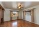 Well-lit bedroom with hardwood floors and neutral walls at 3809 E Highland Ave, Phoenix, AZ 85018