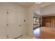 Bright entryway with hardwood floors and built-in shelving at 3809 E Highland Ave, Phoenix, AZ 85018