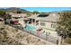 Home with a private pool, spa, and outdoor entertaining space. Solar panels on the roof at 40610 N Bradon Ct, Phoenix, AZ 85086