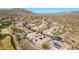 Community overview with numerous homes, a golf course, and desert landscape at 40610 N Bradon Ct, Phoenix, AZ 85086