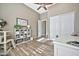 Charming bedroom with wood-look floors and built-in shelving at 40610 N Bradon Ct, Phoenix, AZ 85086