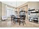 Formal dining room with a large table and hutch at 40610 N Bradon Ct, Phoenix, AZ 85086