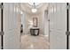 Bright entryway with tile flooring and decorative console table at 40610 N Bradon Ct, Phoenix, AZ 85086