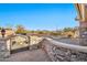 Stone entryway with wrought iron gate and mountain views at 40610 N Bradon Ct, Phoenix, AZ 85086