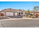 Two-car garage and nicely landscaped front yard at 40610 N Bradon Ct, Phoenix, AZ 85086