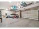 2-car garage with overhead storage and bikes at 40610 N Bradon Ct, Phoenix, AZ 85086