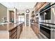 Modern kitchen with stainless steel appliances and granite countertops at 40610 N Bradon Ct, Phoenix, AZ 85086