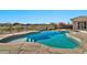 Inviting kidney-shaped pool with flagstone decking at 40610 N Bradon Ct, Phoenix, AZ 85086