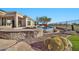 Resort-style backyard oasis with a large pool, spa, and stonework at 40610 N Bradon Ct, Phoenix, AZ 85086