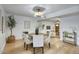 Elegant dining area with a round wooden table and comfortable seating at 413 W Marco Polo Rd, Phoenix, AZ 85027