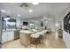 Bright kitchen with an island, stainless steel appliances, and open floor plan at 413 W Marco Polo Rd, Phoenix, AZ 85027