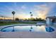 Inviting kidney-shaped pool with diving board at 413 W Marco Polo Rd, Phoenix, AZ 85027