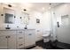 Elegant bathroom, featuring double vanity and a large shower at 4525 N 82Nd St, Scottsdale, AZ 85251