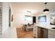 Charming dining room with wood table and modern chandelier at 4525 N 82Nd St, Scottsdale, AZ 85251